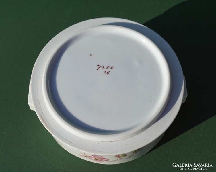 Part of an antique porcelain food barrel with a hand-painted pink poppy flower pattern