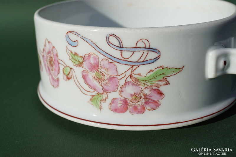 Part of an antique porcelain food barrel with a hand-painted pink poppy flower pattern