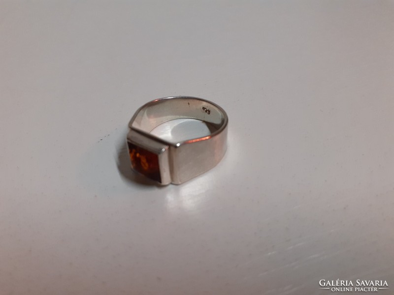 Marked silver ring in old preserved condition with amber stone in its box