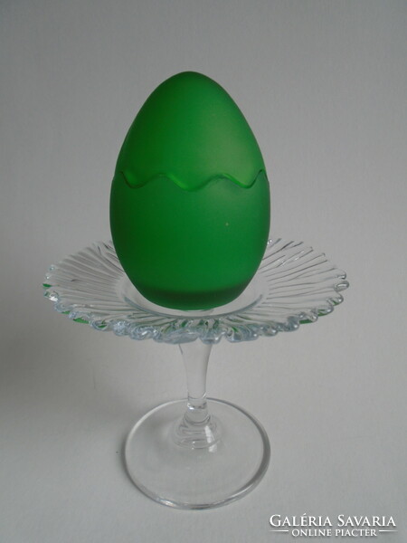 Thick green glass egg.