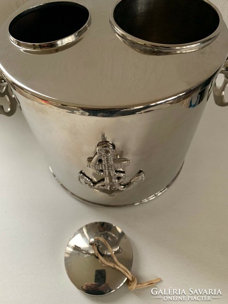 Nautical yacht equipment - a bottle of wine or an ice bucket for a champagne cooler with an anchor decoration