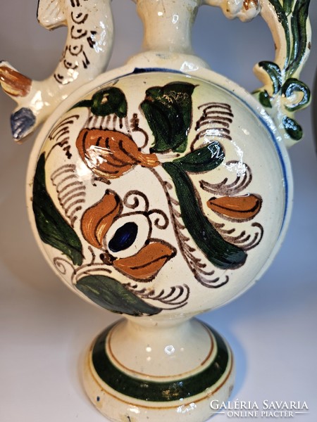 Ceramic jug with folk motifs