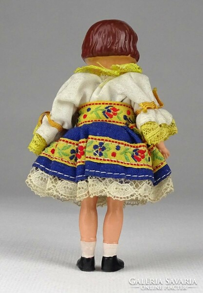 1Q414 old small plastic doll dressed in folk costume 10 cm