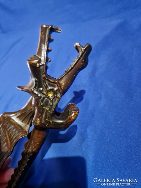 Nutcracker in the shape of a dragon - also a monster for decoration, grotesque figure metal aluminum