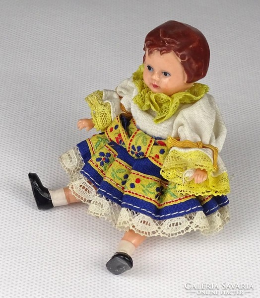 1Q414 old small plastic doll dressed in folk costume 10 cm