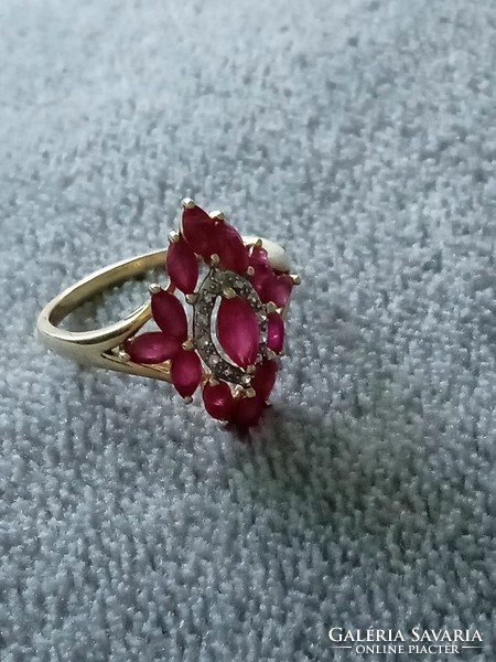 Gold ring with ruby diamond gemstone