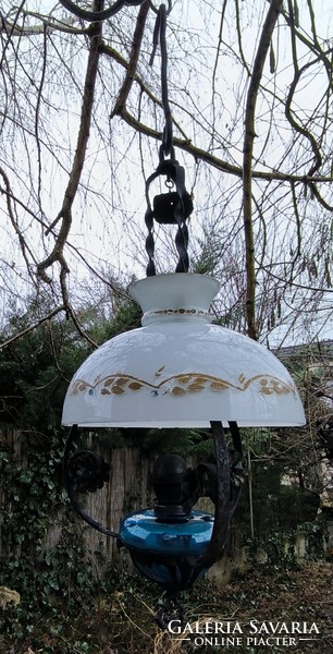Antique petroleum chandelier lamp, wrought iron, milk glass shade. . Even electrified if you put a light bulb in the bulb