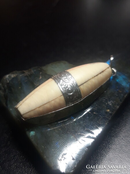 Silver pendant with antique bone inlay