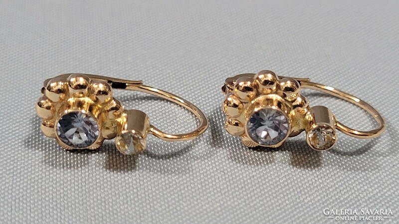 14 K gold women's earrings with pale blue stone 2.64 g