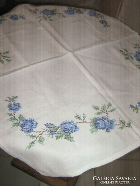 Beautiful blue rose tablecloth embroidered with tiny cross stitches
