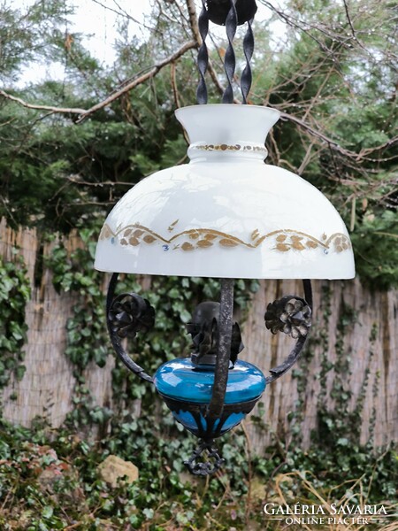 Antique petroleum chandelier lamp, wrought iron, milk glass shade. . Even electrified if you put a light bulb in the bulb