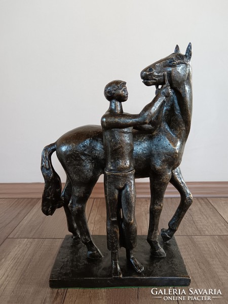 Old bronze statue of a boy with a horse, Croatian