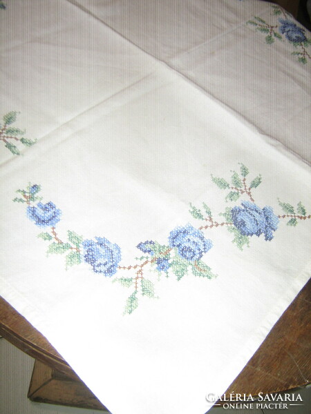 Beautiful blue rose tablecloth embroidered with tiny cross stitches