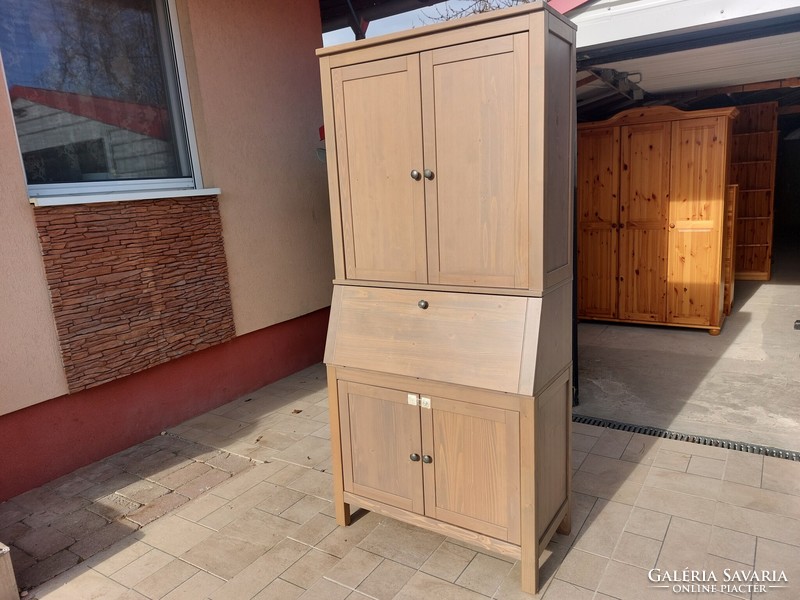 An Ikeas pine wardrobe with a secretary is for sale. Furniture is in used condition, several minor signs of use
