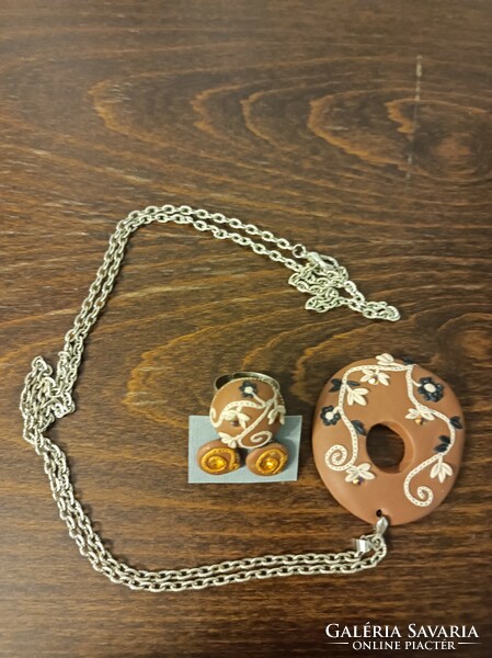 Multi-part, very decorative burnt plastic jewelry set, 3 pieces.