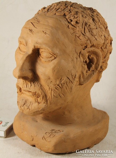 Marked terracotta bust statue with h l signature