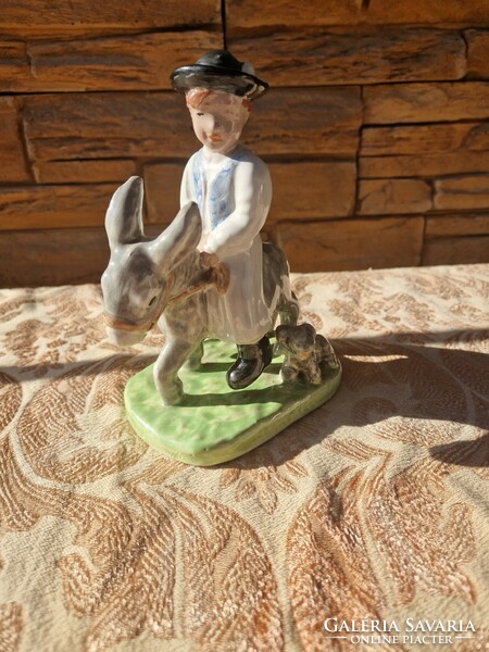 Izsépy ceramics, boy on a donkey, on a donkey's back, with a Puli dog, figure of a boy with a colt.
