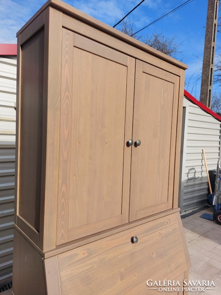 An Ikeas pine wardrobe with a secretary is for sale. Furniture is in used condition, several minor signs of use