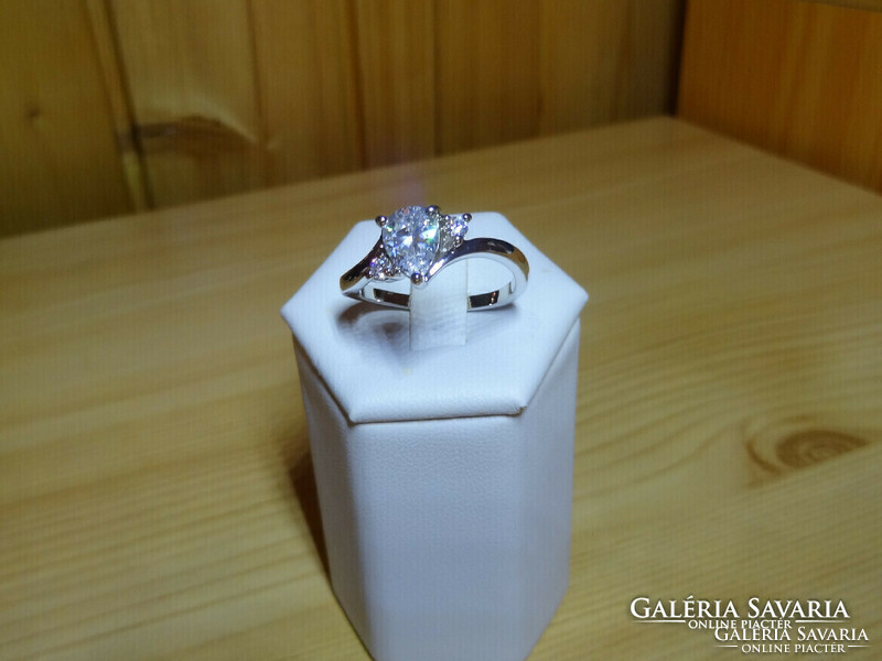 Engagement ring also decorated with beautiful white gold-plated synthetic diamond stone and zirconia