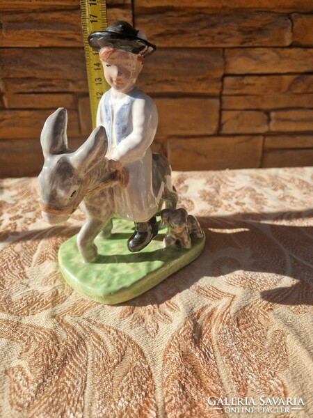 Izsépy ceramics, boy on a donkey, on a donkey's back, with a Puli dog, figure of a boy with a colt.