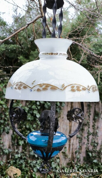 Antique petroleum chandelier lamp, wrought iron, milk glass shade. . Even electrified if you put a light bulb in the bulb