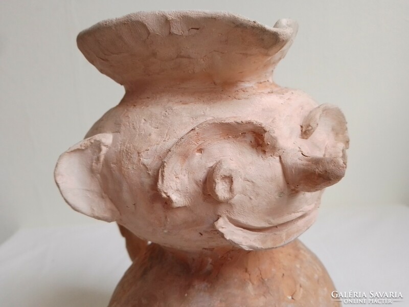 Unique, funny, cheerful, grotesque figure-shaped, unglazed, applied fired clay jar with ears, marked