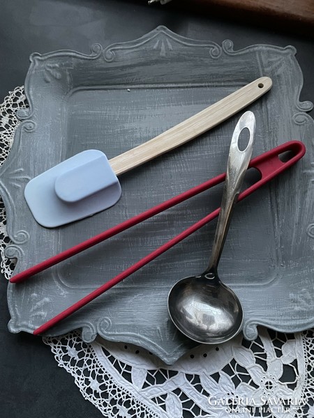 All kinds of kitchen tools: mixer, tongs, small ladle