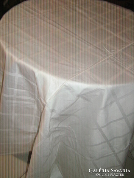Beautiful snow-white checked light huge damask tablecloth