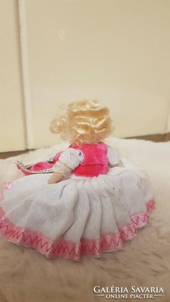 Porcelain head doll in folk costume