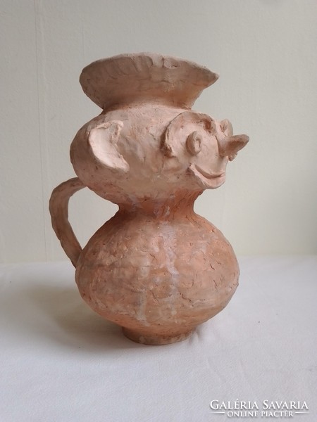 Unique, funny, cheerful, grotesque figure-shaped, unglazed, applied fired clay jar with ears, marked