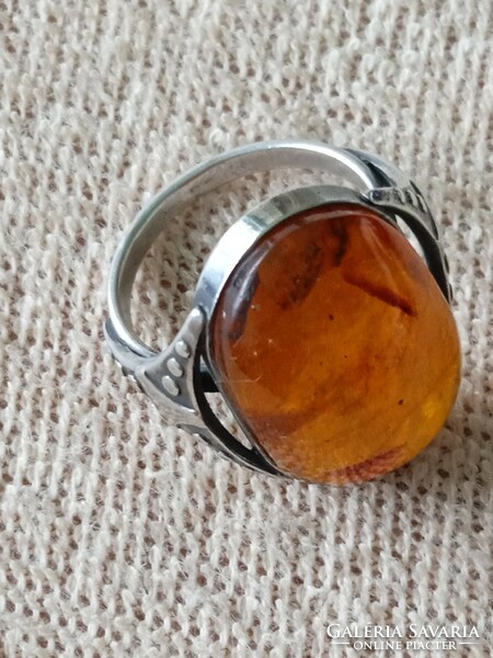 Silver ring with amber stones