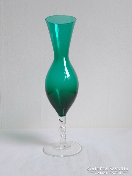 Specially shaped, beautiful deep emerald green colored glass vase with colorless twisted stem and base