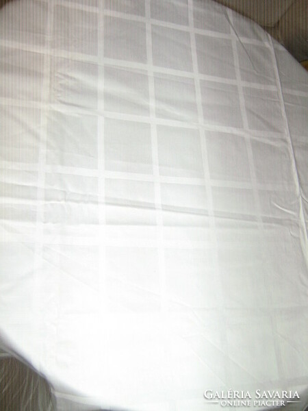 Beautiful snow-white checked light huge damask tablecloth