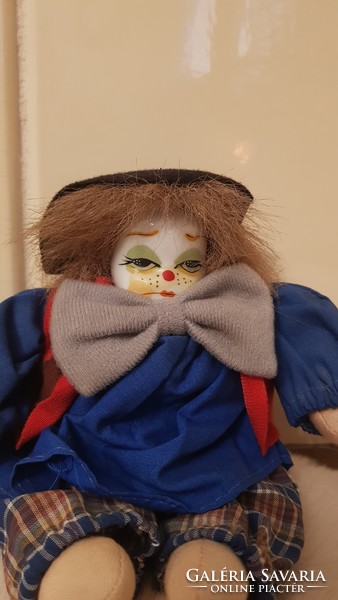 Doll clown with a porcelain head