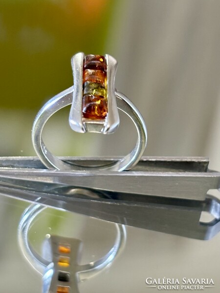 Unique silver ring with amber inlay
