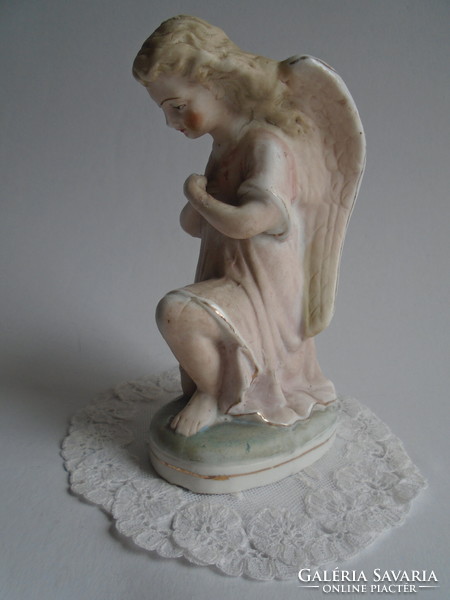 Biscuit angel neck height: 14 cm.