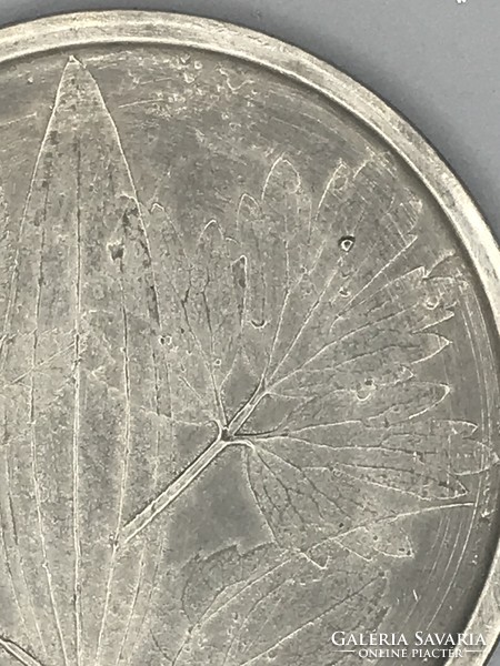 Pewter bowl with leaf pattern