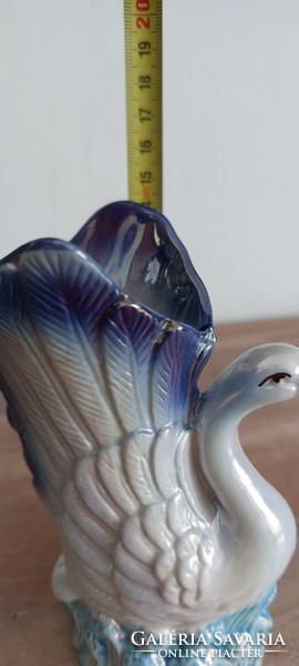 Iridescent porcelain vase depicting a swan and chick, 14 cm high