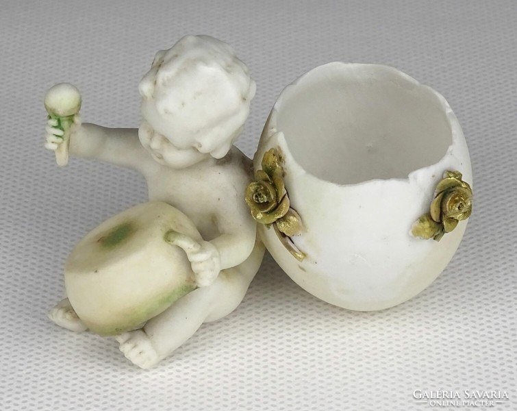 1Q347 antique small marked biscuit with putto drum and egg