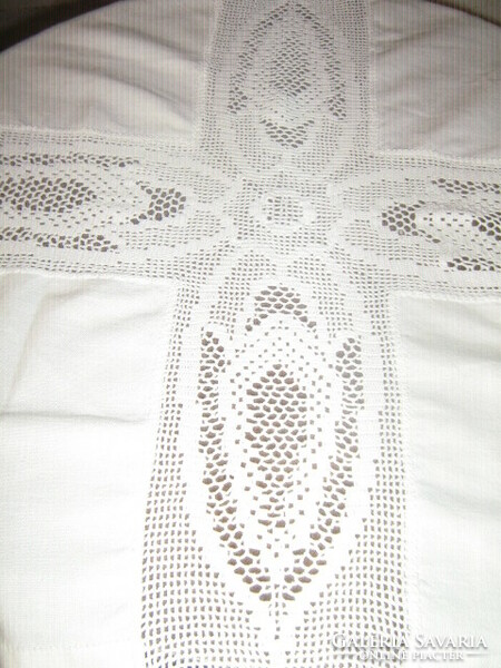 Beautiful handmade crocheted snow-white woven tablecloth