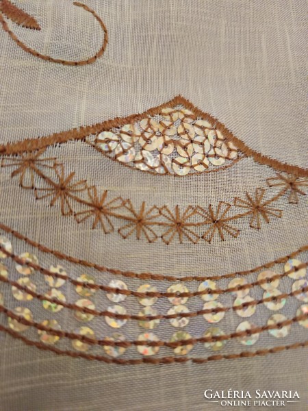 Oriental tablecloth with gold-brown embroidery and sequins