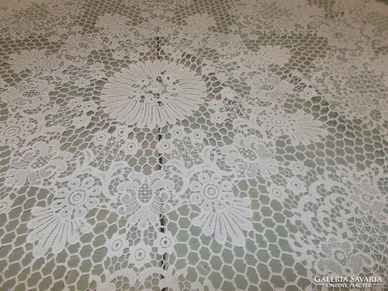 Beautiful snow-white round Brussels lace tablecloth