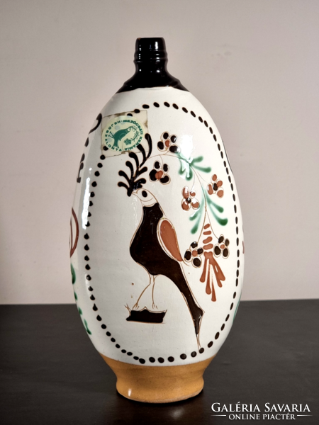 Glazed bottle with Mezőcsát painting with bird inscription dated 1981.
