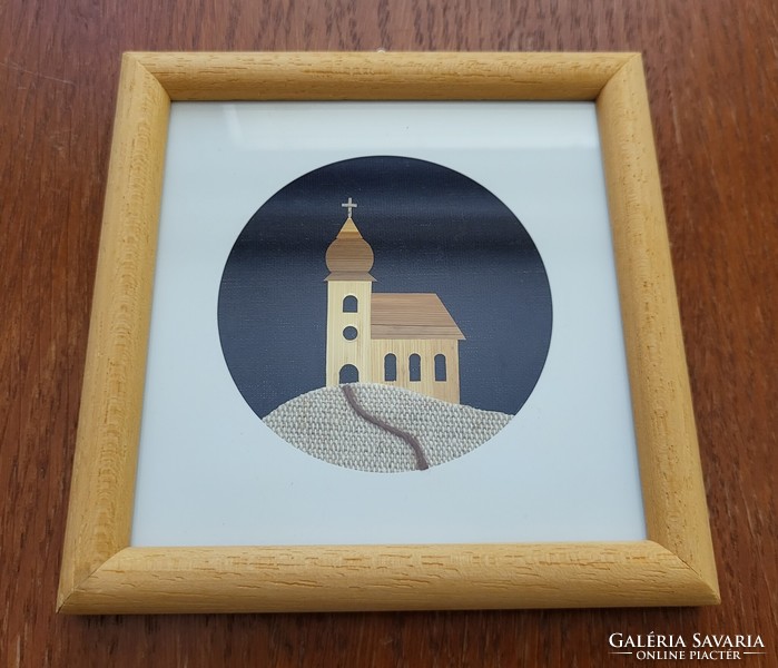 Straw canvas picture with church pattern glazed in a frame