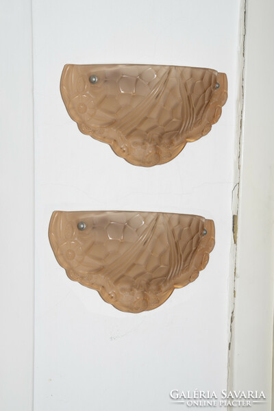 A pair of French Lalique style wall arms