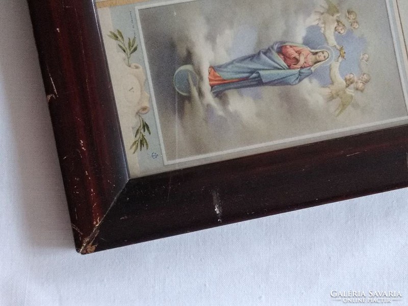 Series of antique holy pictures in a wooden picture frame