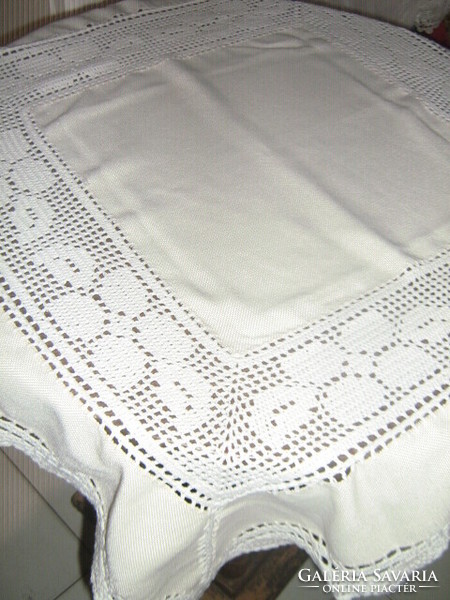 Beautiful handmade crocheted and inlaid buttery tablecloth