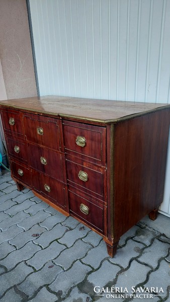 A 200-year-old chest of drawers with copper fittings