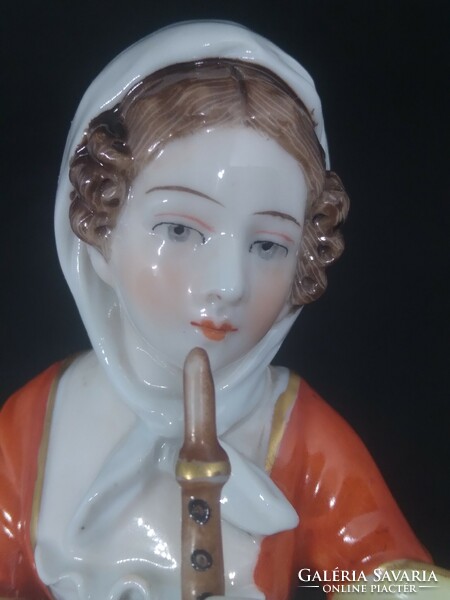 Hand-painted porcelain figurine marked Alt wien - woman with lamb