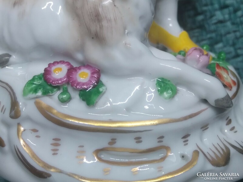 Hand-painted porcelain figurine marked Alt wien - woman with lamb